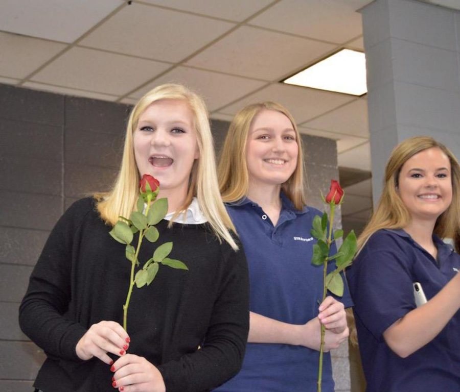 Marta Stevenson, left, who turned Sweet Sixteen on Valentines Day, is ready with other yearbook presenters Sophie Denisar and Betsy Hill