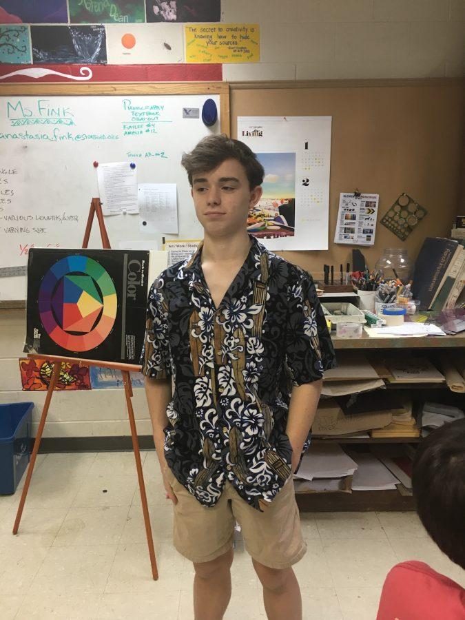 Andrew Delves wears a Hawaiian shirt on Tropical Day. (photo by Molly Garud)