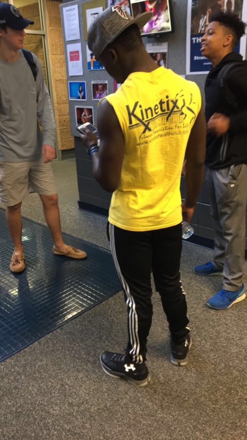 Freshman Edlin St. Vil brings out his athletic wear for workout day.  (Photo by Taylor Swan)
