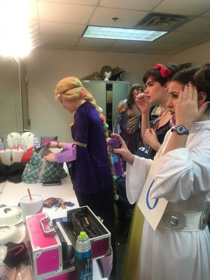 Cast of Once Upon a Mattress gets ready for their second performance.