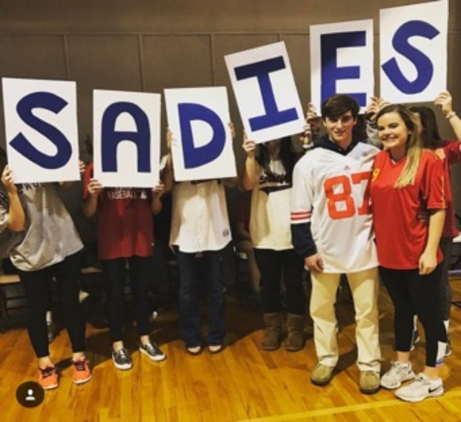 Sophomore Betsy Hill used an idea from the stratford student section (lovingly dubbed the grady bunch) to ask her date John Morgan Manley. Hill used six separate signs to spell out “Sadies?” 
