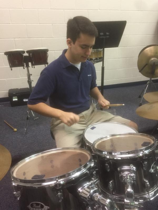 Noah Fenimore practices the drums. Fenimore, a sophomore, was selected as a member of the district honor band