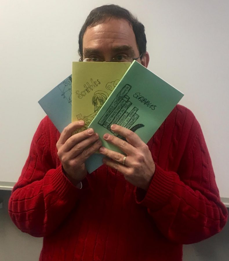 Dr. Frank Katz, an advisor for Stratfords literary magazine, holds several recent issues of Scribbles.