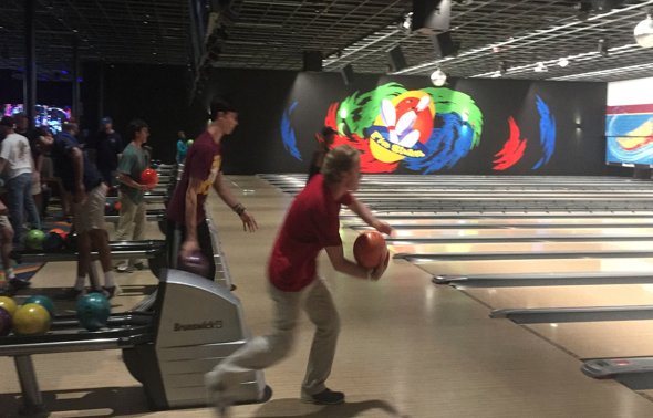 Junior McKinley Thompson, left, and senior Josh Bevill take aim at a recent practice