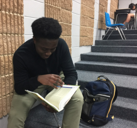 Sophomore Tomi Sagade reads a book during study hall