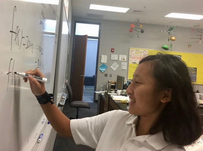 Sophomore Jocelyn Tang works on a math equation