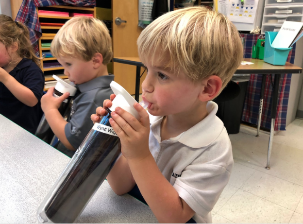 Wyatt Wiggs, a student in Mrs. Susan Abernathys 3K class, takes a sip from a new water bottle

Mrs. Abernathy’s class 3k beginners