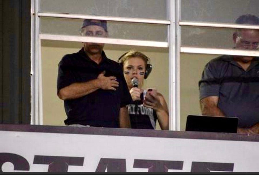 Caroline Cole singing the national anthem in the Stratford press box at the FPD game on Oct. 13, 2017