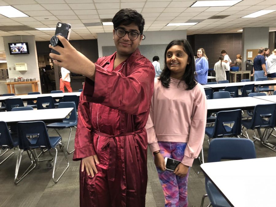 Freshman, Milind Rugnath and Annum Ahmed take a selfie in their spirit week attire!