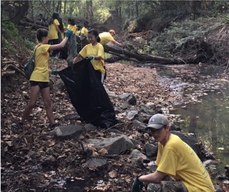 (L-R) Maddie Fackler, Jocelyn Tang, and Andrew Moring took part in the river clean-up at Amerson Park last month.