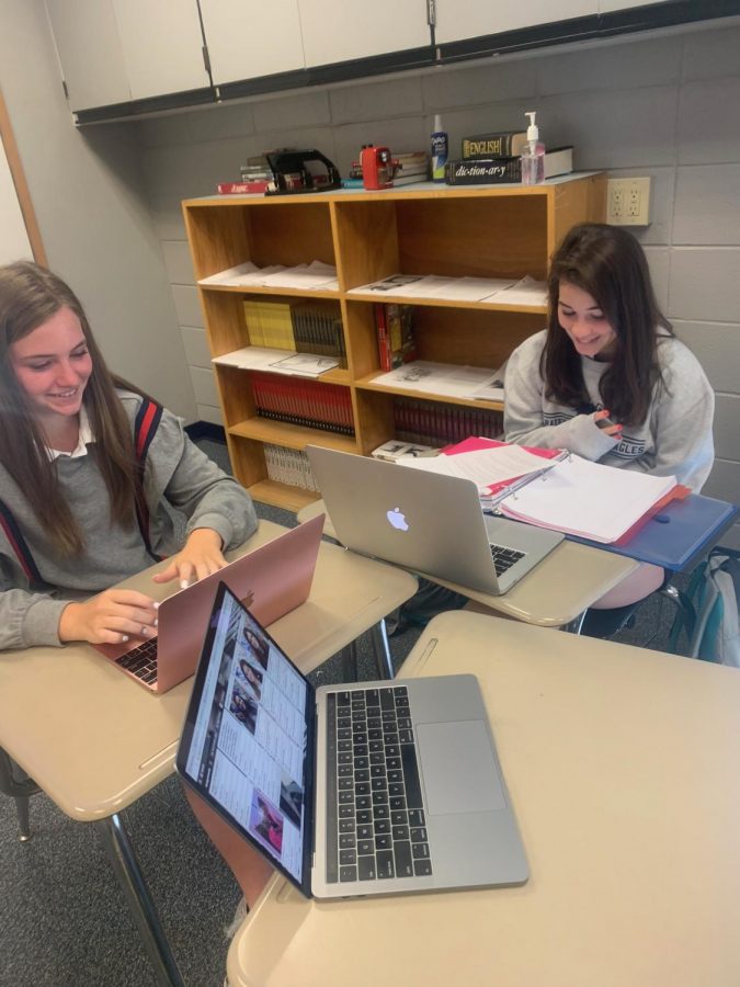 Langley Anne and Peyton Lovett working in economics! 