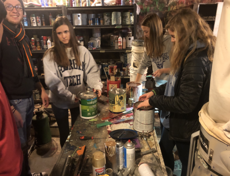 Juniors roll up their sleeves, then have afternoon of fun