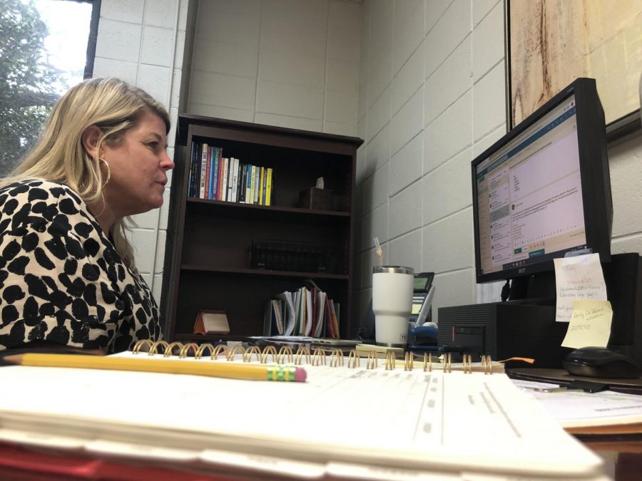 College counselor Mrs. Jackie Guy stays busy in her office